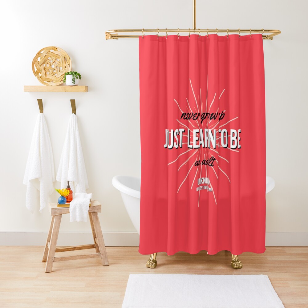 "Never grow up" shower curtain featuring a quote by Author Unknown